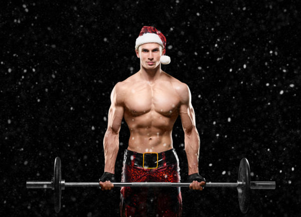 Holidays and celebrations New year Christmas sports bodybuilding healthy lifestyle - Muscular handsome sexy Santa Claus Ded Moroz